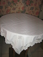 Beautiful and elegant white azure embroidered crochet tablecloth