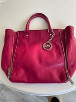 Beautiful fuchsia colored michael kors leather bag
