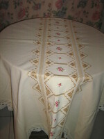 Elegant woven tablecloth with beautiful floral hand-embroidered azure crochet edge