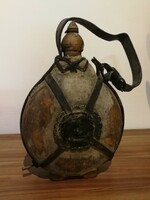 Antique horsehide water bottle.