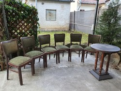 6 art deco riveted chairs, 1 art deco round table