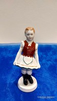 Aquincum porcelain, girl in folk costume.