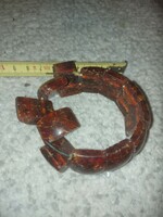 Amber-like bracelet with torn rubber, to be re-stringed