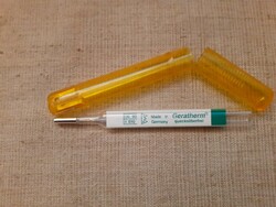 Old glass thermometer in its own case in its case