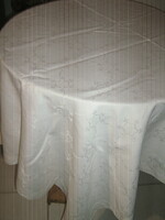 Beautiful pale cream-colored elegant Toledo damask tablecloth