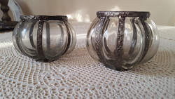 2 glass tealight holders blown into a decorative metal frame.