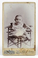 1Q278 studio of elbl and pietsch: antique photograph of a baby in an antique cane effect thonet chair ~ 1900