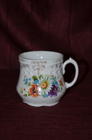 Old flower mug