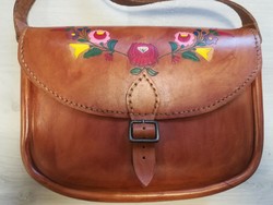Beautiful, genuine leather women's shoulder bag with an embossed flower motif