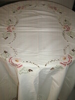 Beautiful antique vintage floral ribbon embroidered on ecru tablecloth
