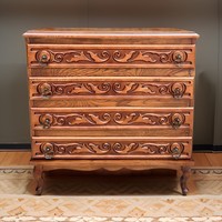 Neo-baroque chest of drawers with four drawers