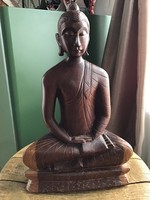 Hand carved wooden Buddha statue