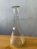 Old, graceful, glass pouring bottle