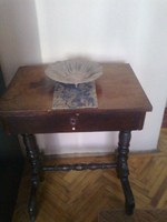 A pretty little pewter sewing table