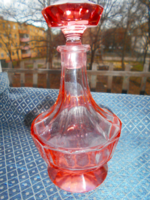 Peach-pink faceted glass bottle