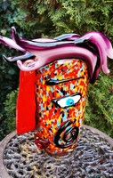 An interesting artwork from Murano - a face hidden in a vase :)