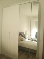 Brand new two-part wardrobe, white high-gloss and mirrored