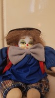 Doll clown with a porcelain head
