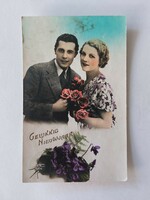 Old postcard photo of a loving couple