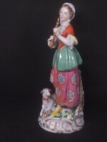 Hand-painted porcelain figurine marked Alt wien - woman with lamb