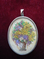 Antique pendant, lockwork, dried flowers in a vase.