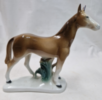 German porcelain horse marked Lippelsdorf (gdr) on a pedestal, in perfect condition 17 cm.