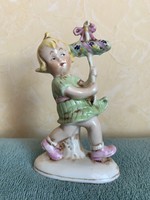 German porcelain little girl with a maypole in her hand