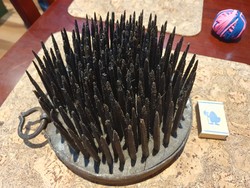 A hemp comb in a medieval comb or carding device
