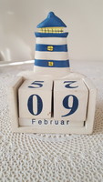 Wooden perpetual calendar with lighthouse