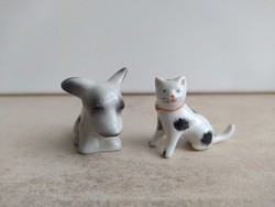 Retro raven house miniature spotted dog-kitten couple