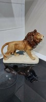 Antique large porcelain lion statue