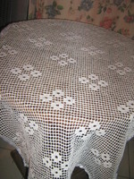 Antique white crocheted silk floral tablecloth
