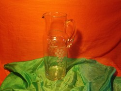 Glass wine jug.