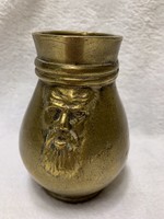 Antique bronze jug with handmade motif