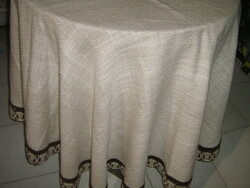 Beautiful lacy-edged oval elegant woven tablecloth