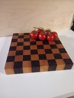 Checkered cutting board made of thick hardwood
