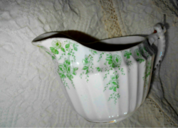 Porcelain pouring jug with ribbed surface