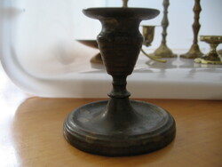 Old copper candle holder with patina