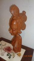 African lady, breast statue beautifully carved from wood
