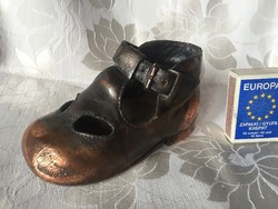 Cute bronzed doll, children's shoes - not an antique piece!