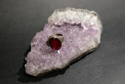 Classic style silver ring with sparkling red stone