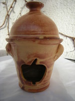 A ceramic apple steamer works with a tea bag