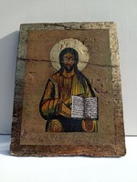 Jesus icon on painted wooden board