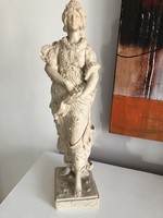 Statue of a lady made of very hard material, 47 cm high