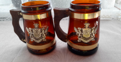 Brown glass beer mug with wooden handle
