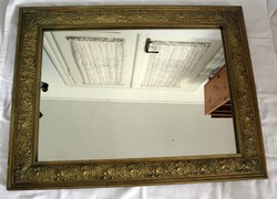 Old antique gilded carved wooden framed mirror