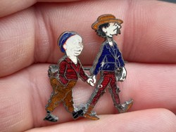 A very old fire enamel badge