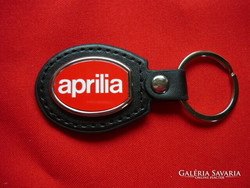 Aprilia oval metal key ring on a leather base
