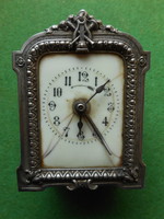 Antique travel alarm clock