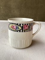 Old pink porcelain mug.